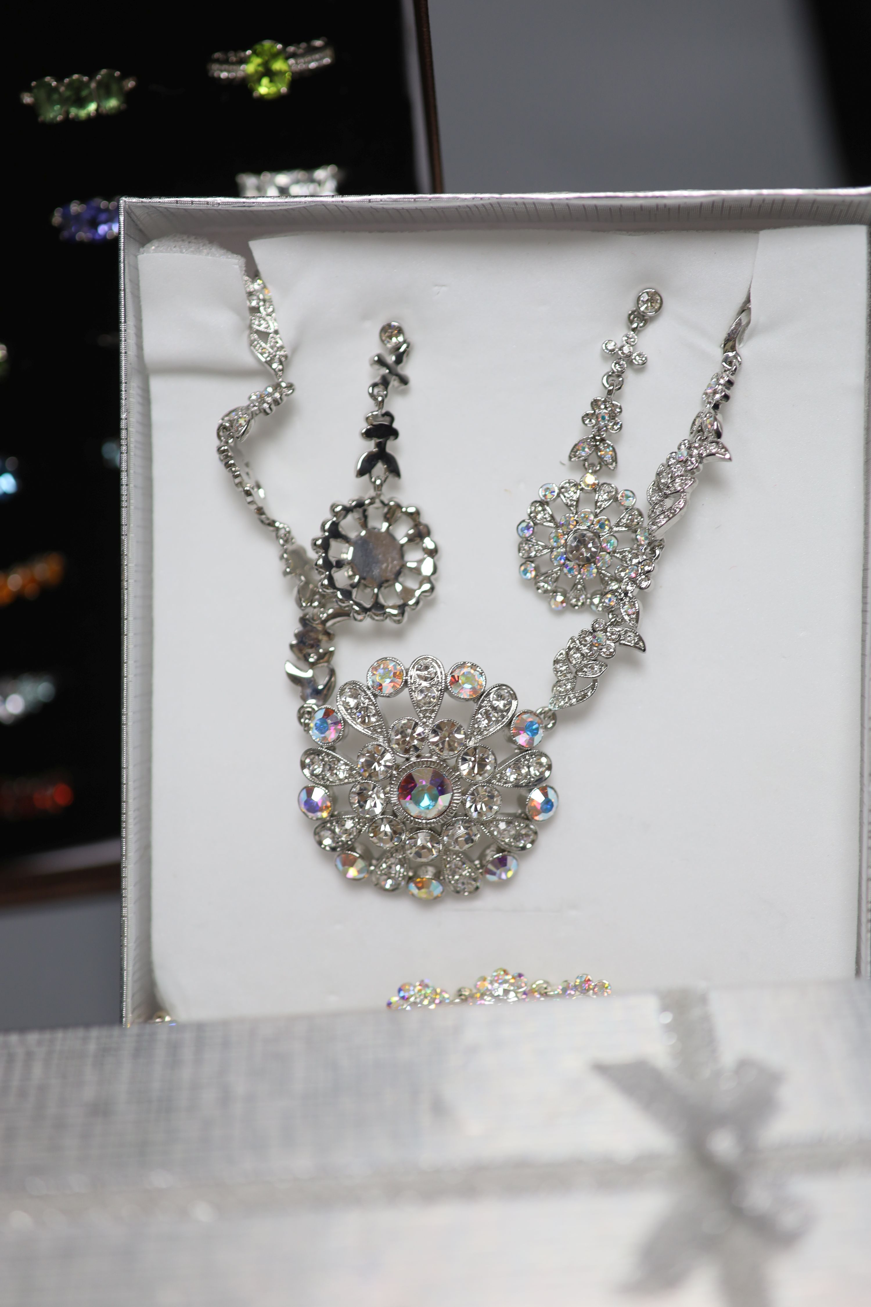 A large quantity of Swarovski costume jewellery and one hundred and thirty mainly 925 rings.